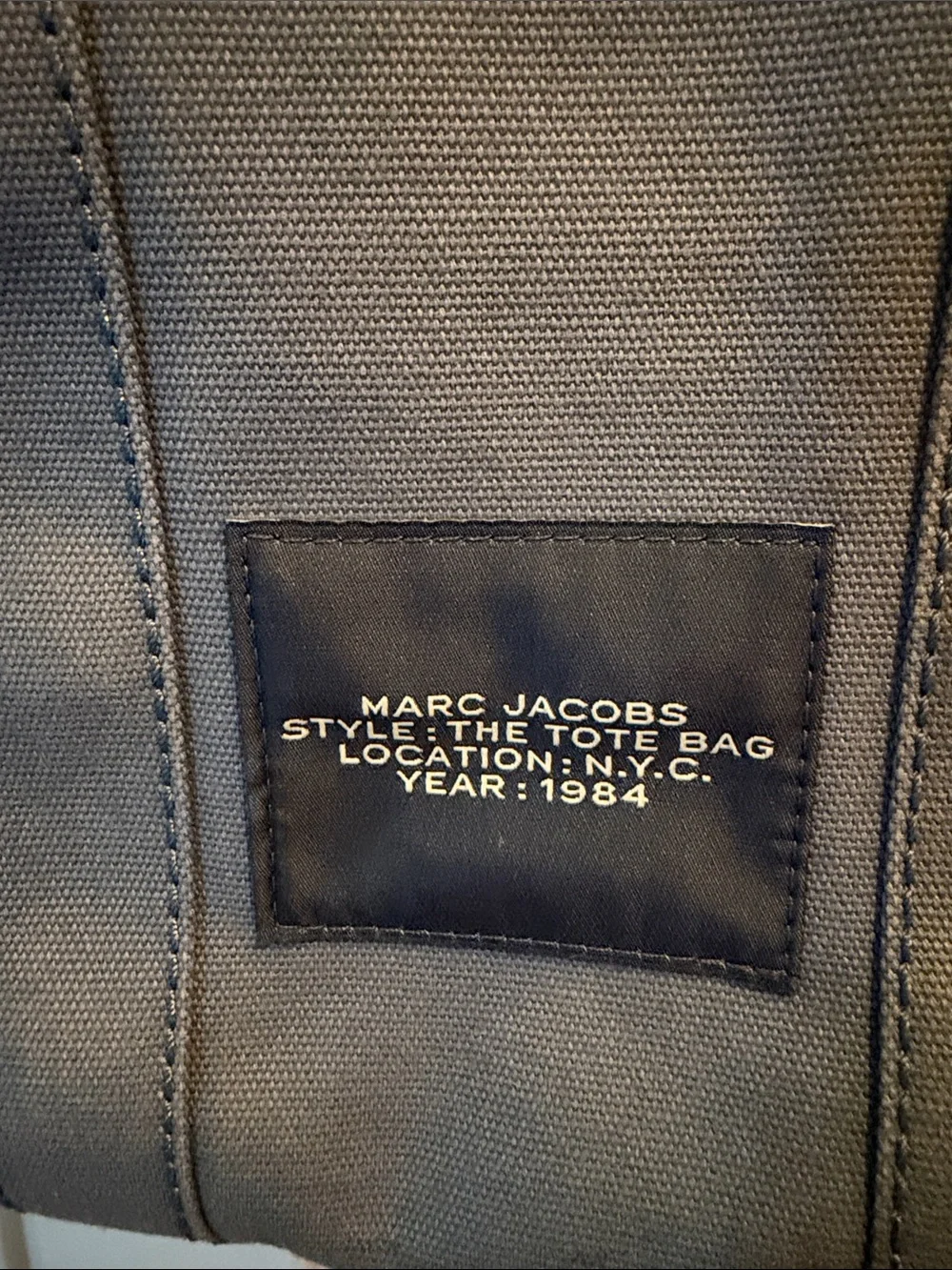 Marc Jacobs compact canvas